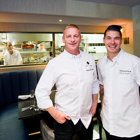 Bilderberg Garden Hotel Amsterdam Exterior photo Chef Michael Mina (left) and his son Michael Mina Jr. (right) at Michael Mina's restaurant in Las Vegas